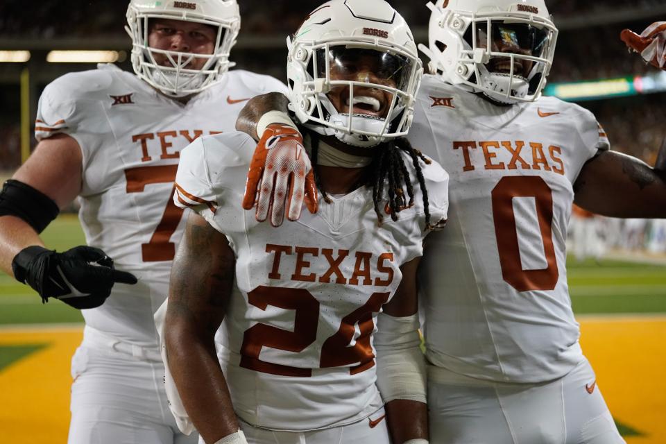 Sep 23, 2023; Waco, Texas, USA; Texas Longhorns running back Jonathon Brooks (24) celebrates with teammates after scoring a touchdown run against the Baylor Bears during the first half at McLane Stadium.