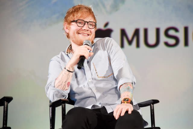 <p>Kevin Mazur/Getty </p> Ed Sheeran speaks onstage at Apple Music Presents With Ed Sheeran in Los Angeles on August 27, 2018.