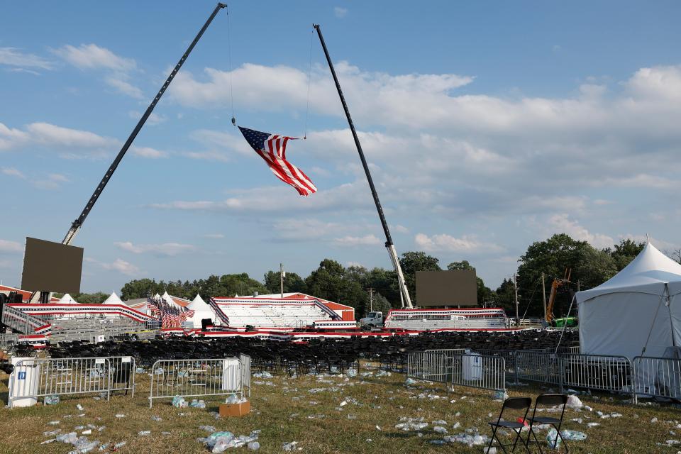 Campaign signs and empty water bottles are seen on the ground of a campaign rally for Republican presidential candidate former President Donald Trump on July 13, 2024 in Butler, Pennsylvania.