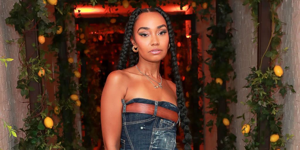 leigh anne pinnock attends the launch party wearing denim strapless dress