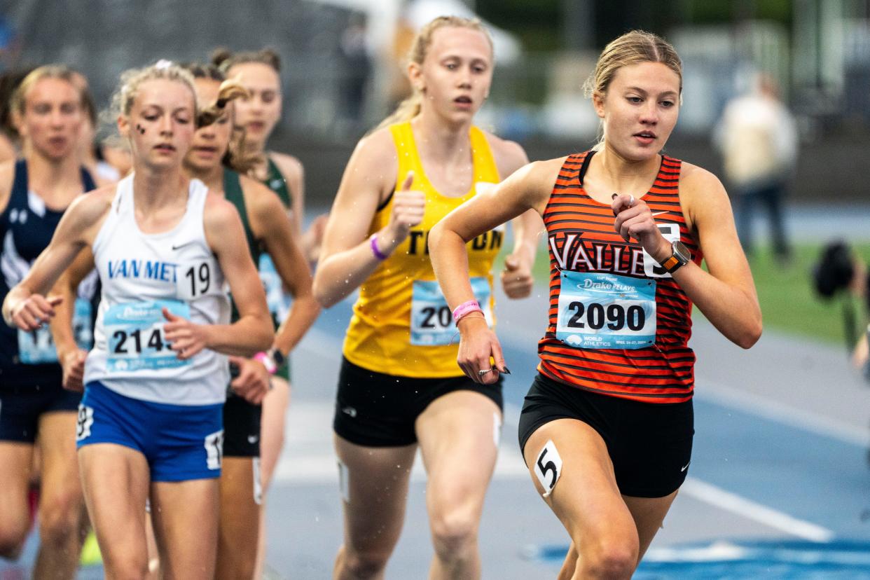 West Des Moines Valley's Addison Dorenkamp, right, competes in the 1,500-meter run during the Drake Relays on Saturday. The Valley senior won the race, finishing in 4:26.93.