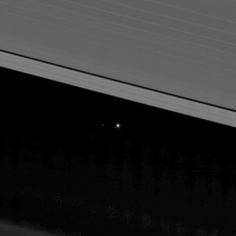 An image of earth taken by Cassini from within Saturn's rings - Credit: PA