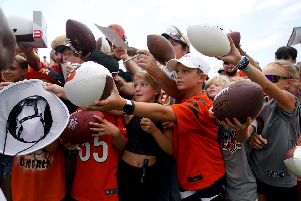 Jul 28, 2023; Cincinnati, Ohio, USA; Young fans wait for autographs at the conclusion of the Cincinnati Bengals training camp practice at the practice fields next to Paycor Stadium. Mandatory Credit: Kareem Elgazzar/The Cincinnati Enquirer-USA TODAY Sports