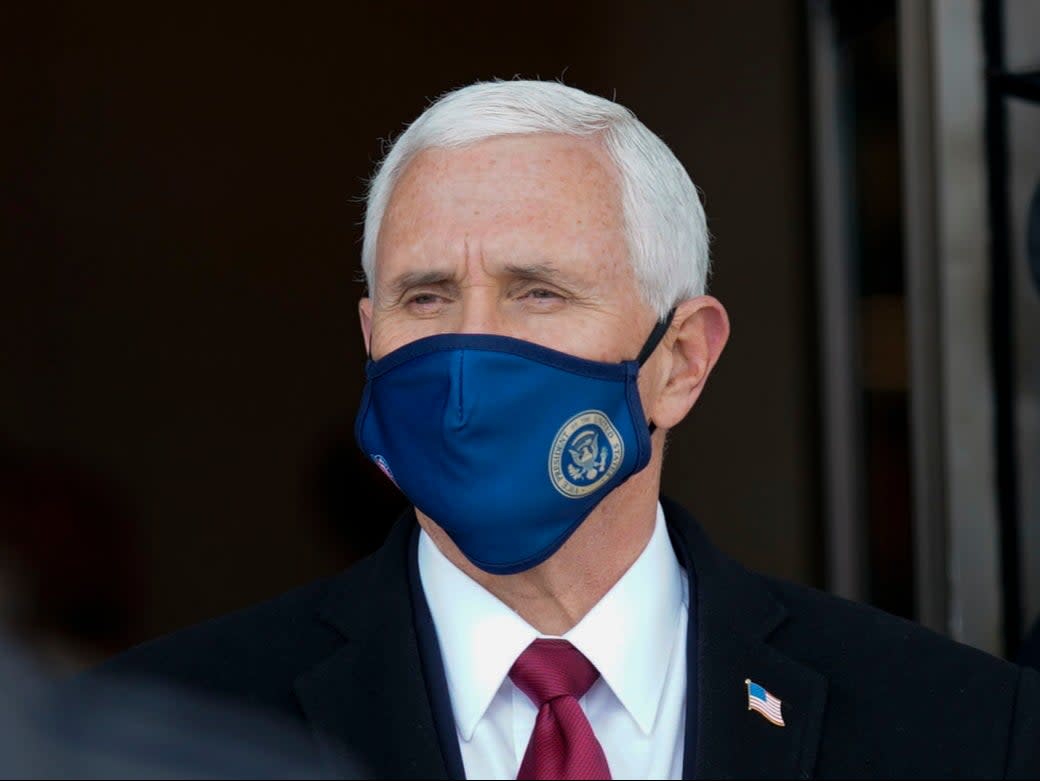 <p>Former Vice President Mike Pence departs after the inauguration of President Joe Biden on 20 January, 2021</p> (Getty Images)