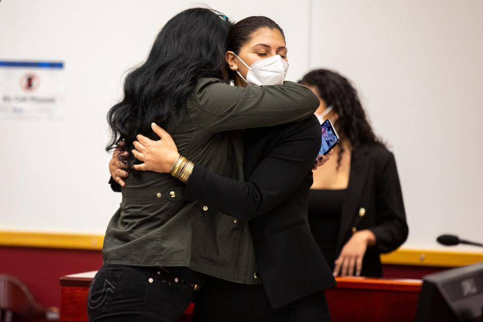 Des Moines Register Reporter Andrea Sahouri hugs her mom Muna Tareh-Sahouri after being found not guilty at the conclusion of her trial, on Wednesday, March 10, 2021, at the Drake University Legal Clinic, in Des Moines, Iowa.