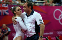 (L-R) McKayla Maroney of the United States looks on as she is consoled by coach Yin Alvarez after she fell on a dismount while competing in the Artistic Gymnastics Women's Vault Final on Day 9 of the London 2012 Olympic Games at North Greenwich Arena on August 5, 2012 in London, England. (Photo by Ronald Martinez/Getty Images)