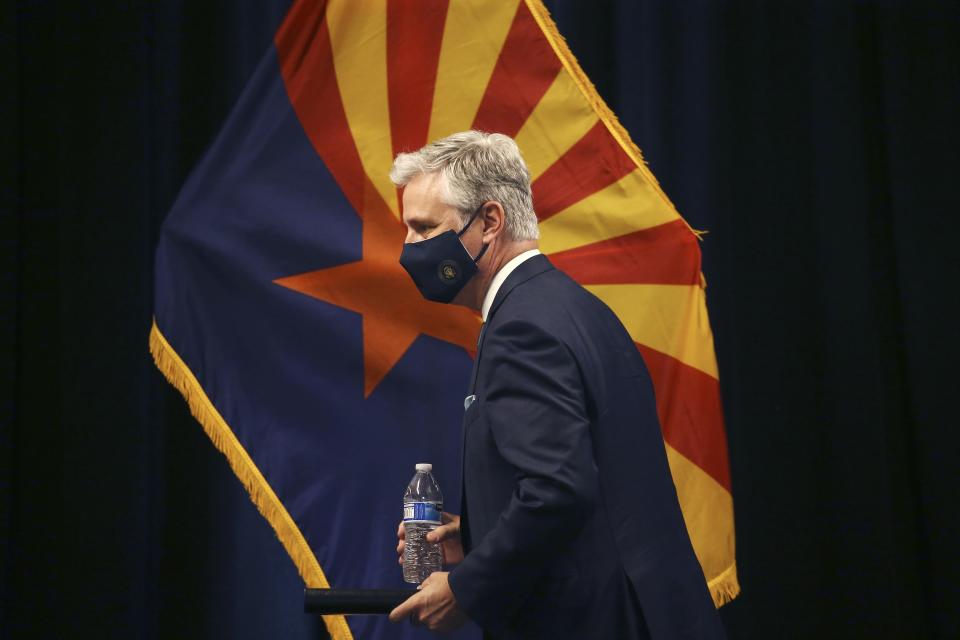 Robert O'Brien, assistant to the president for national security affairs, walks to the podium to speak during a news conference regarding China Wednesday, June 24, 2020, in Phoenix. (AP Photo/Ross D. Franklin)