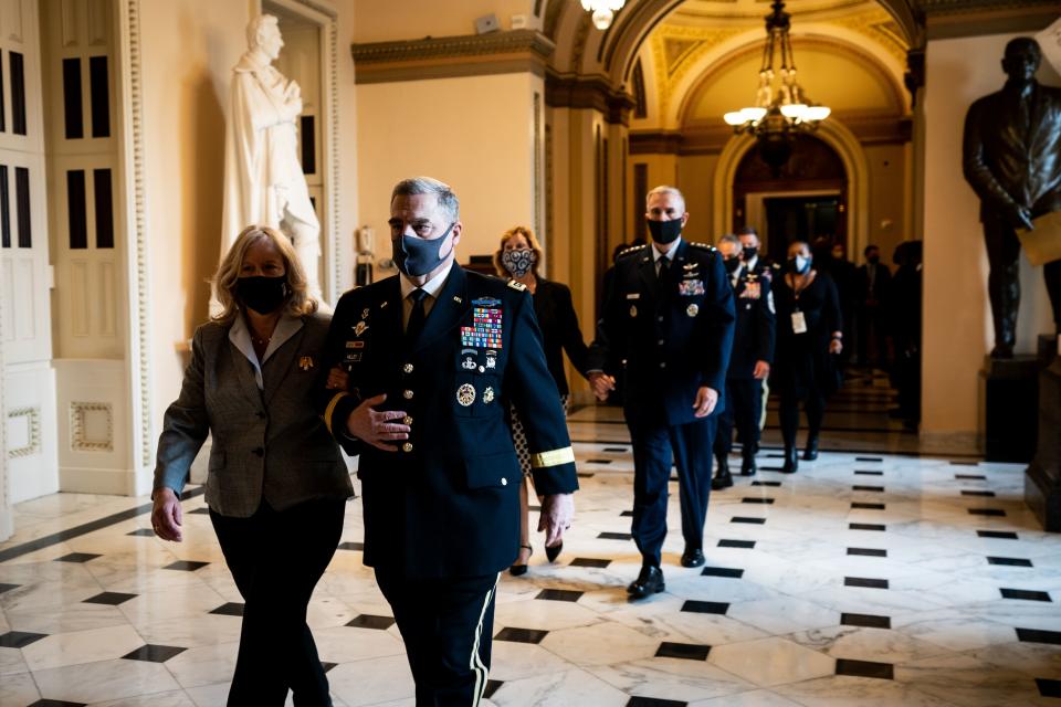 Gen. Mark Milley, chairman of the Joint Chiefs of Staff, walks to pay his respects as the late Justice Ruth Bader Ginsburg at the Capitol on Sept. 25, 2020. 