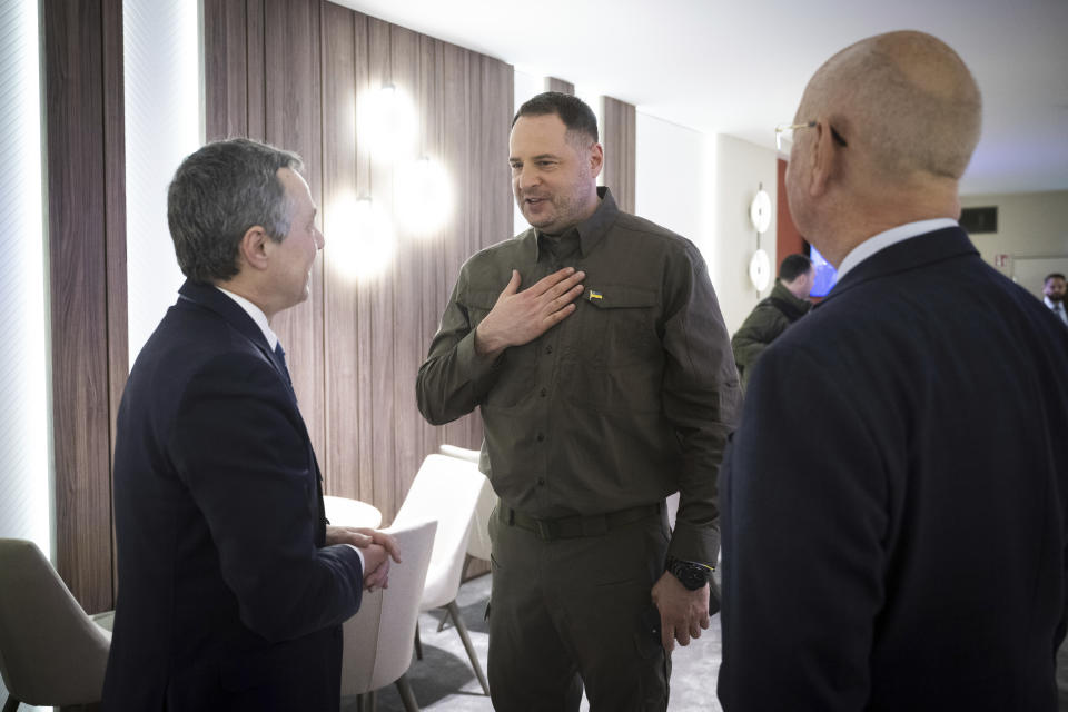 From left, Swiss Federal Councillor Ignazio Cassis, the Head of the Ukrainian President's Office, Andriy Yermak, and Klaus Schwab, founder of the World Economic WEF, talk prior the 4th meeting of the National Security Advisors (NSA) on the peace formula for Ukraine, in Davos, Switzerland, Sunday, Jan. 14, 2024. (Gian Ehrenzeller/Keystone via AP)