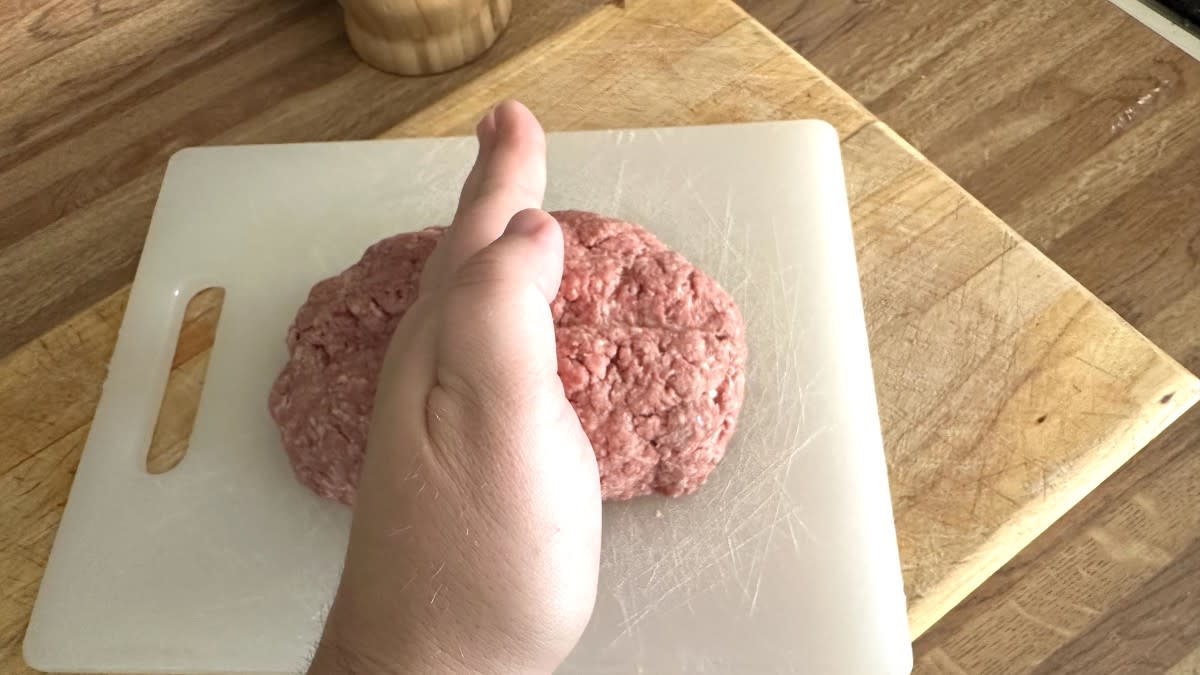 Scoring Meat With Back Of Hand<p>Krista Marshall</p>
