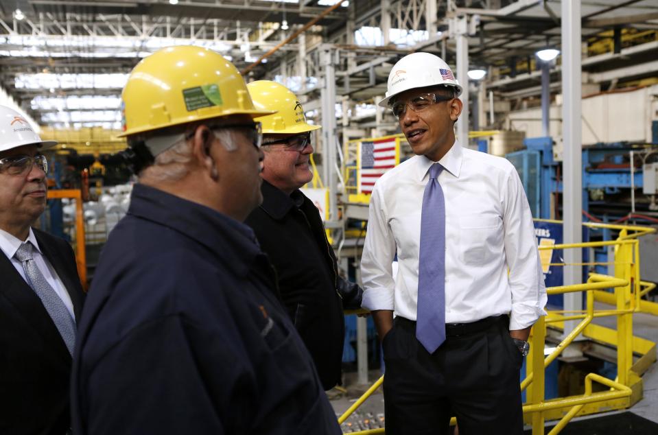 U.S. President Barack Obama tours the ArcelorMittal steel mill in Cleveland, Ohio, in this November 14, 2013 file photo. As Washington tightened its belt in recent years, the budget cuts sliced more deeply in states where President Obama is unpopular, according to a federal spending analysis by Reuters. Between the 2009 and 2013 fiscal years, funding for a wide swath of discretionary grant programs, from Head Start preschool education to anti drug initiatives, fell by an average of 40 percent in Republican-leaning states like Texas and Mississippi. To match Exclusive USA-POLITICS/SPENDING REUTERS/Kevin Lamarque/Files (UNITED STATES - Tags: BUSINESS COMMODITIES POLITICS)