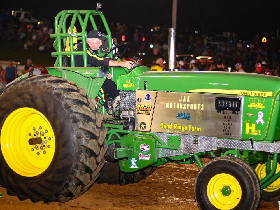 Kenny Sandridge honored the late Herman Kinsinger during the tractor pull at Expo earlier this summer;