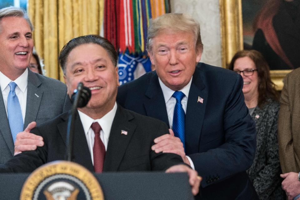 US President Donald Trump in November welcomed Broadcom CEO Hock Tan’s decision to move the company back to the United States, but this week blocked the Singapore firm’s planned takeover of US chip rival Qualcomm (AFP File Photo/NICHOLAS KAMM)