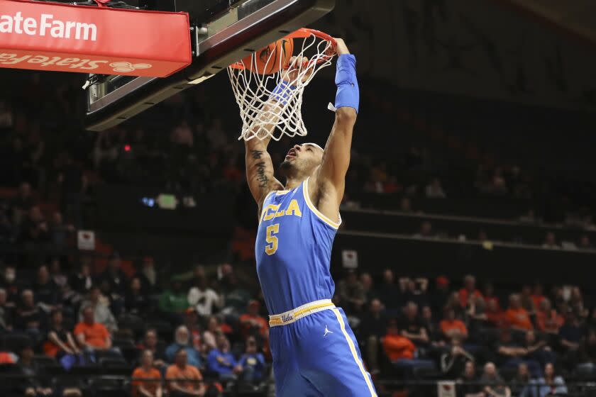 UCLA guard Amari Bailey (5) dunks against Oregon State during the second half of an NCAA college basketball game in Corvallis, Ore., Thursday, Feb. 9, 2023. UCLA won 62-47. (AP Photo/Amanda Loman)