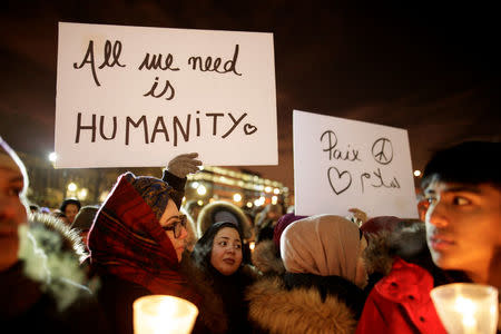 People attend a vigil in support of the Muslim community in Montreal, Quebec, January 30, 2017. REUTERS/Dario Ayala