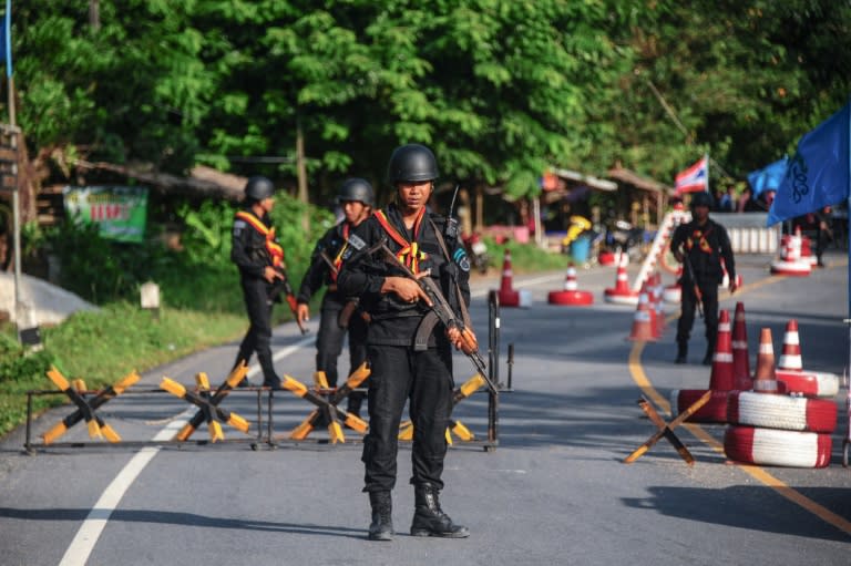 A manhunt is underway for 20 ethnic Uighurs from China who made a daring escape from an immigration detention centre in southern Thailand, with police expecting them to make a dash for the border with Malaysia