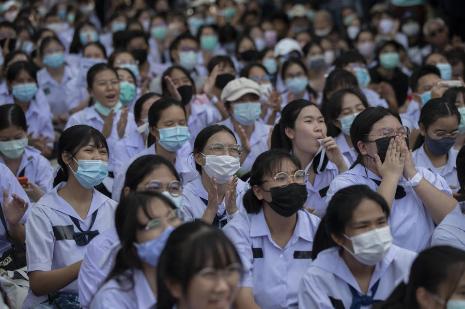 High school students claps and blow whistles during a protest rally in Bangkok, Thailand, Saturday, Sept. 5, 2020. The student's demonstration comes at a time of mass anti-government protests led predominantly by university students, putting added strain on the under-pressure administration of Prime Minister Prayuth Chan-ocha. (AP Photo/Gemunu Amarasinghe)