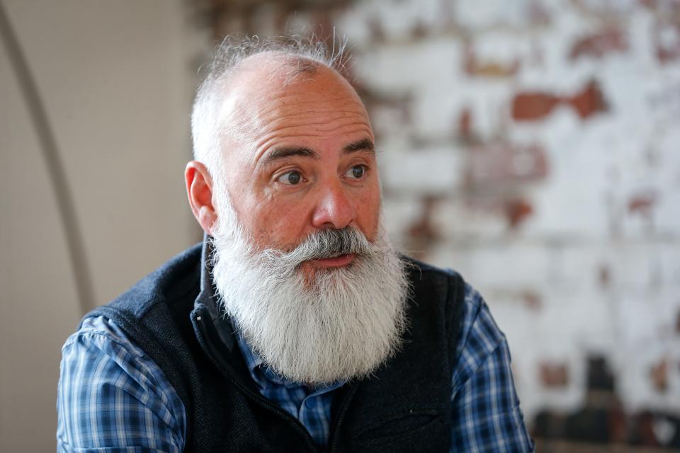 City council candidate Bruce Adib-Yazdi speaks about his campaign at The Vecino Group office on Historic Commercial Street on Tuesday, Feb. 21, 2023. Adib-Yazdi is running for General Seat D.