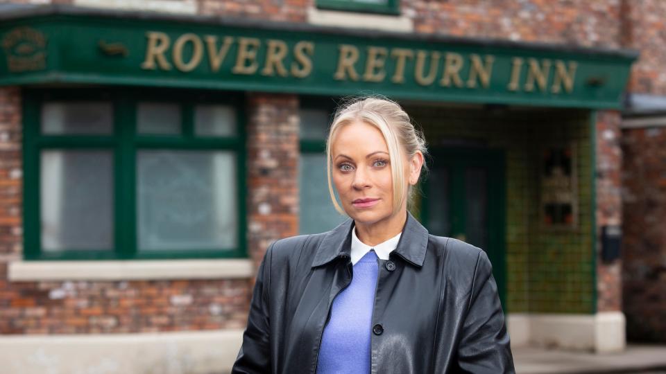 DS Lisa Swain standing outside the Rovers Return Inn.