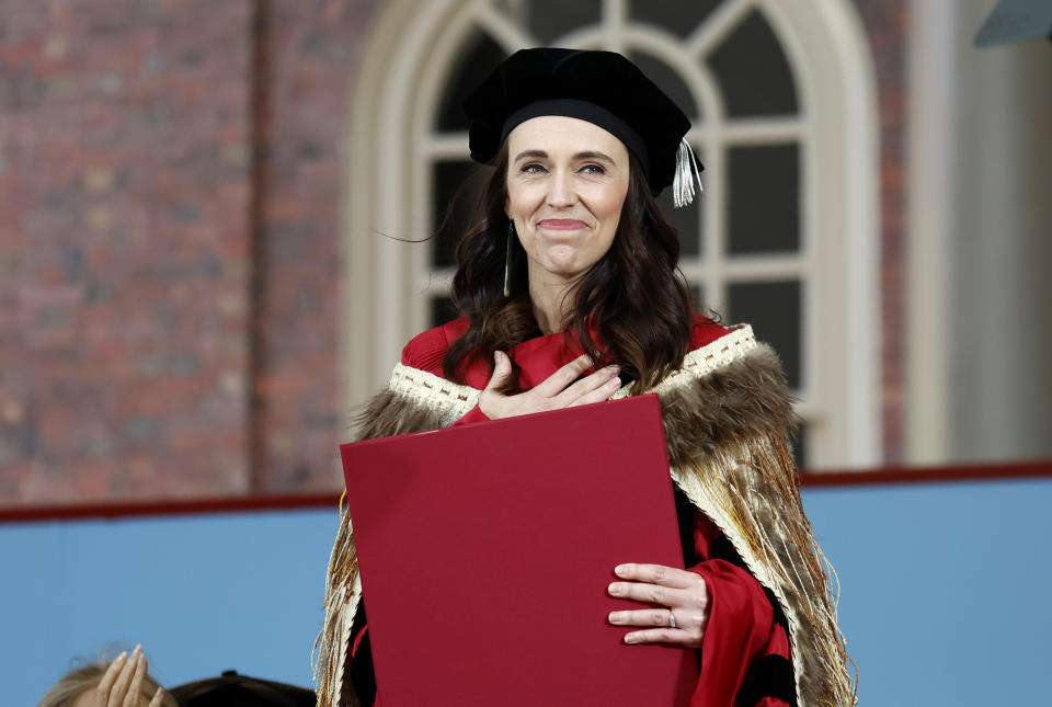 New Zealand Prime Minister Jacinda Ardern reacts after receiving an honorary degree before speaking at Harvard's 371st Commencement, Thursday, May 26, 2022, in Cambridge, Mass. (AP Photo/Mary Schwalm)