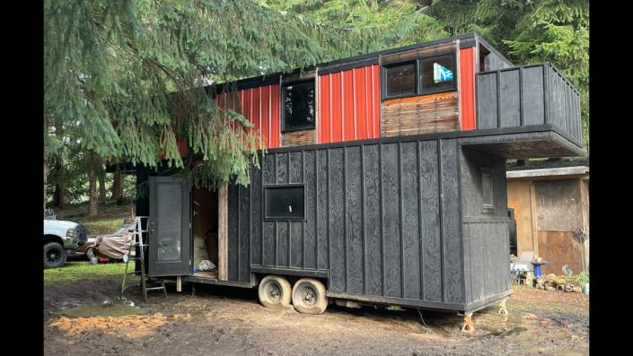 A man was arrested after deputies said they found a stolen tiny house while arresting him on unrelated charges.