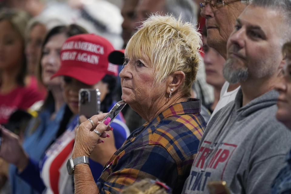 Supporters of former President Donald Trump attend a commit to caucus rally, Wednesday, Sept. 20, 2023, in Maquoketa, Iowa. (AP Photo/Charlie Neibergall)