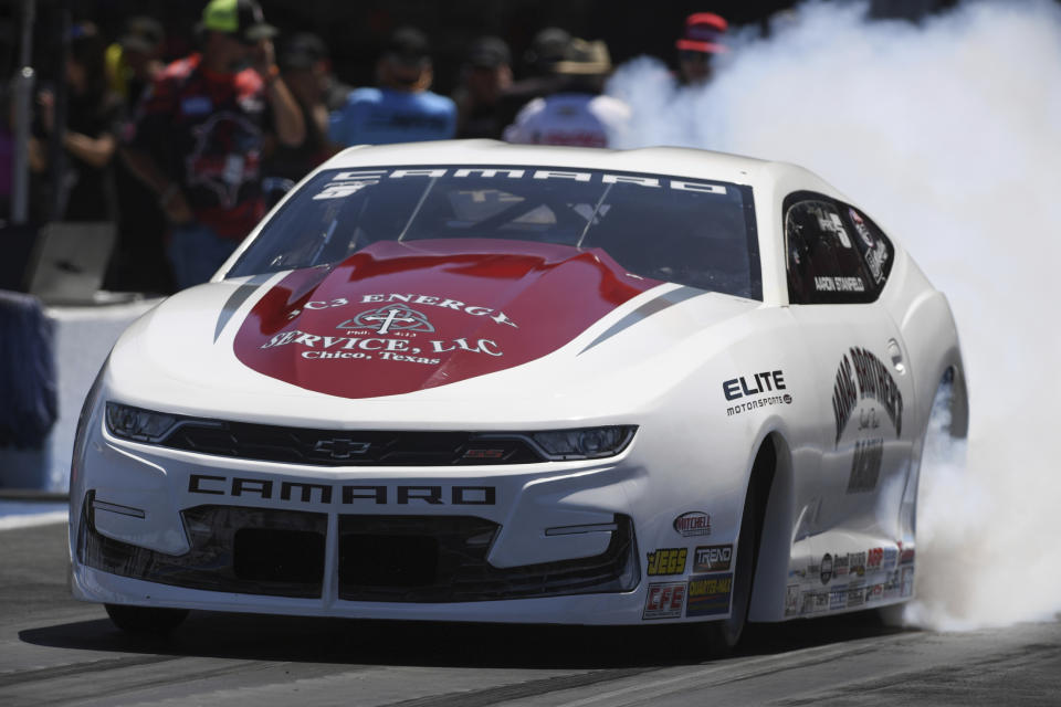 In this photo provided by the NHRA, Aaron Stanfield picks up his first victory at Bristol Dragway during the NHRA Thunder Valley Nationals drag races in Bristol, Tenn., Sunday, June 19, 2022. ( Jerry Foss/NHRA via AP)