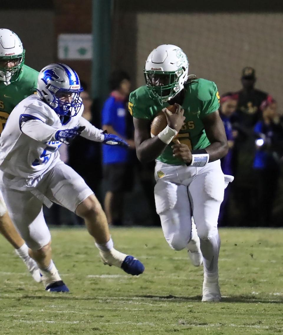 DeLand's TJ Moore was the only player in the Volusia-Flagler-St. Johns area to throw for 1,000 yards and rush for 1,000 yards this season.