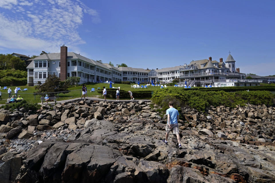 The Beachmere Inn overlooks the rocky coast Wednesday, May 26, 2021, in Ogunquit, Maine. The inn is one of many businesses are facing a worker shortage. (AP Photo/Robert F. Bukaty)