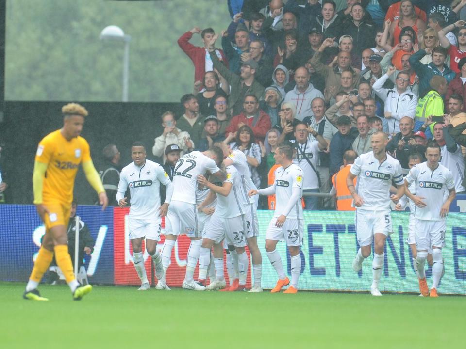 Swansea celebrate after Jay Fulton puts them ahead of Preston North End: Getty