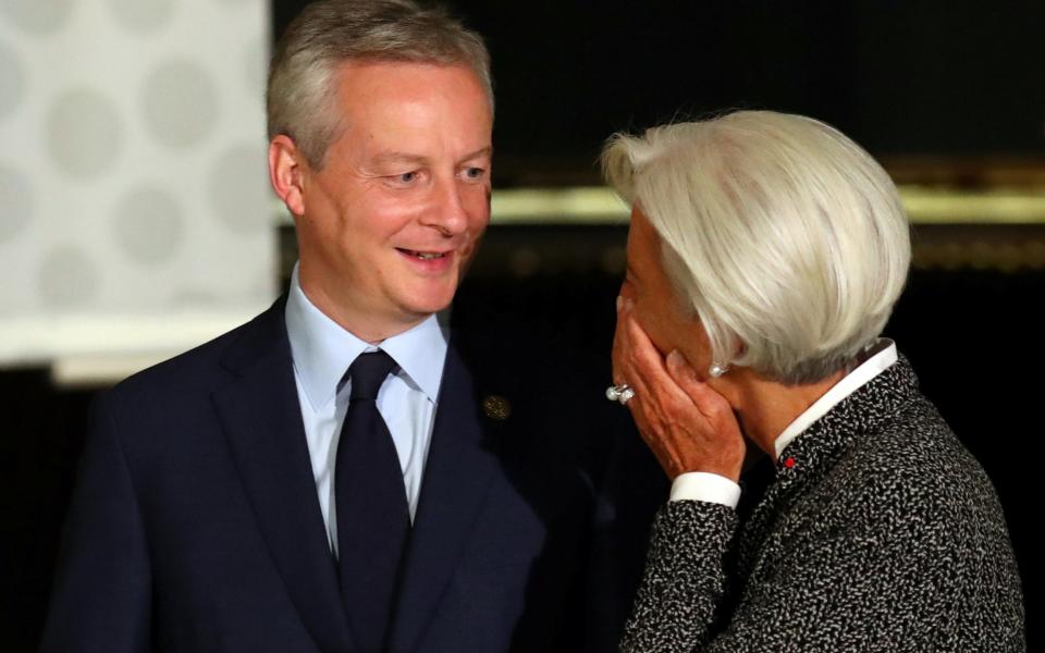 Bruno Le Maire, the French finance minister, greets Christine Lagarde, managing director of the IMF, at the G20 summit in Buenos Aires - REUTERS