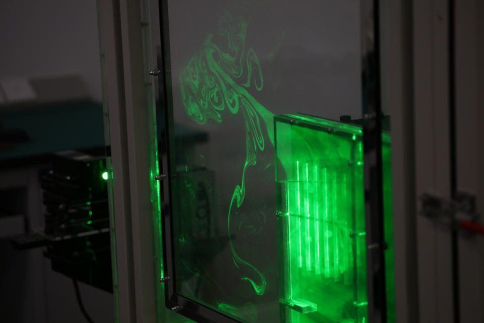 In this Aug. 21, 2019, photo, lasers are used to demonstrate heat flow from heat sink designs at the Huawei Thermal design lab in Dongguan in Southern China's Guangdong province. Facing a ban on access to U.S. technology, Chinese telecom equipment maker Huawei is showing it increasingly can do without American components and compete with Western industry leaders in pioneering research. (AP Photo/Ng Han Guan)