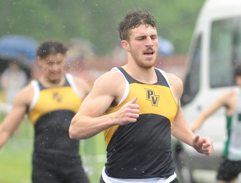 Paint Valley's Cole Miller concludes the 100m dash during the Scioto Valley Conference track and field championships at Huntington High School on May 12, 2023.