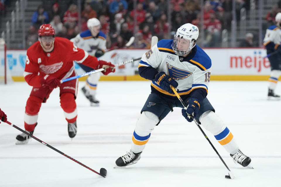 St. Louis Blues left wing Jakub Vrana (15) shoots against the Detroit Red Wings in the first period of an NHL hockey game Thursday, March 23, 2023, in Detroit. (AP Photo/Paul Sancya)