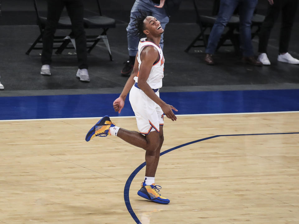 New York Knicks guard Immanuel Quickley (5) celebrates after making a 3-point basket against the Atlanta Hawks in overtime of an NBA basketball game Wednesday, April 21, 2021, in New York. (Wendell Cruz/Pool Photo via AP)