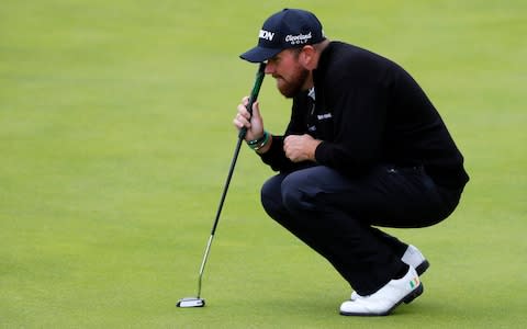 Shane Lowry of Ireland lines up a putt on the 18th green during the first round of the 148th Open Championship held on the Dunluce Links at Royal Portrush Golf Club on July 18, 2019 in Portrush, United Kingdom - Credit: Getty Images
