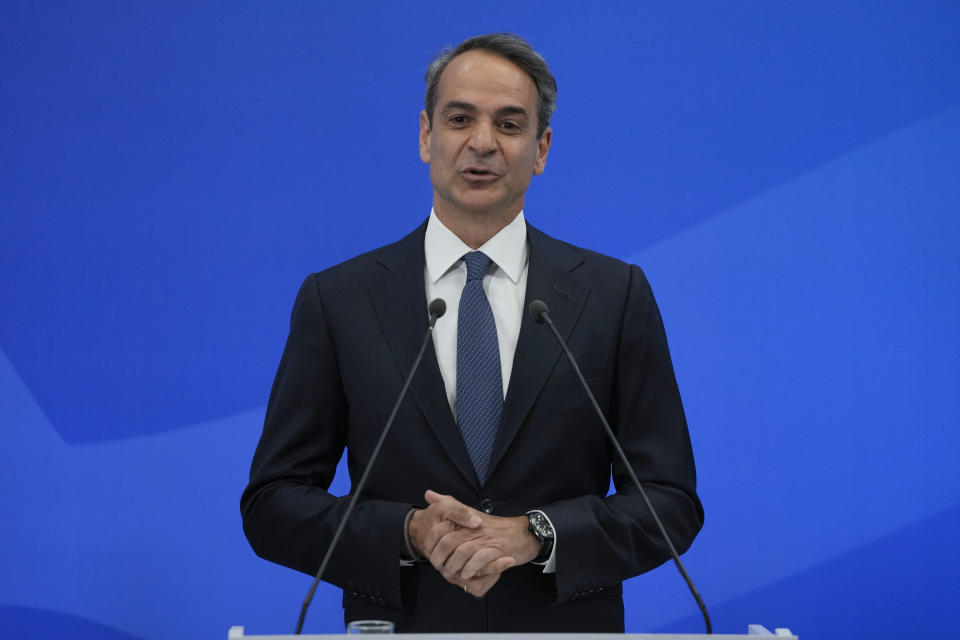 Greece's Prime Minister and leader of New Democracy Kyriakos Mitsotakis gives a speech at the headquarters of his party in Athens, Greece, Sunday, May 21, 2023. Prime Minister Kyriakos Mitsotakis and his conservative party are leading Greece's election by a wide margin, according to partial official results, but a new electoral law means he will be unable to form a government without seeking coalition partners, and a second election is likely. (AP Photo/Thanassis Stavrakis)