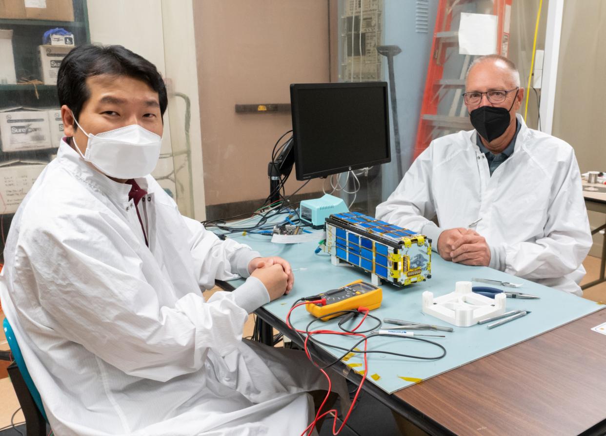 From left: Hyeongjun Park, assistant professor in the Department of Mechanical and Aerospace Engineering and Steven Stochaj, interim department head of the Department of Electrical and Computer Engineering are leading a team of students on a Northrop Grumman sponsored project to develop methods to help CubeSats with autonomous docking.