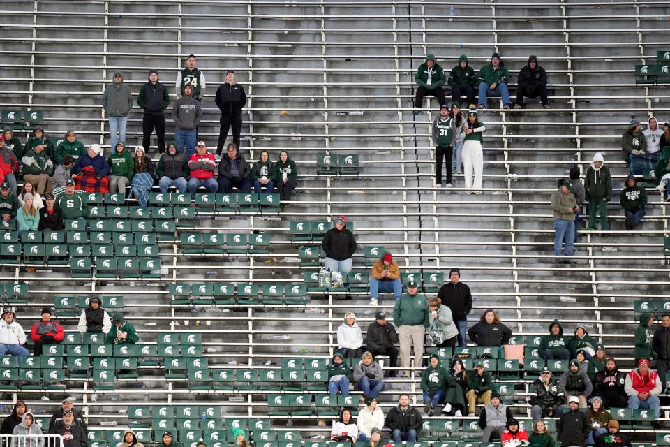 Oct 8, 2022; East Lansing, Michigan, USA; Michigan State Spartans fans and Ohio State Buckeyes fans watch in the fourth quarter of the NCAA Division I football game between the Ohio State Buckeyes and Michigan State Spartans at Spartan Stadium. 