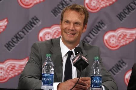 Detroit Red Wings defenseman Nicklas Lidstrom answers questions after announcing his retirement from NHL hockey during a news conference at Joe Louis Arena in Detroit, Michigan May 31, 2012. REUTERS/Rebecca Cook