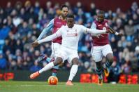 Football Soccer - Aston Villa v Liverpool - Barclays Premier League - Villa Park - 14/2/16 Divock Origi scores the fourth goal for Liverpool Reuters / Phil Noble Livepic