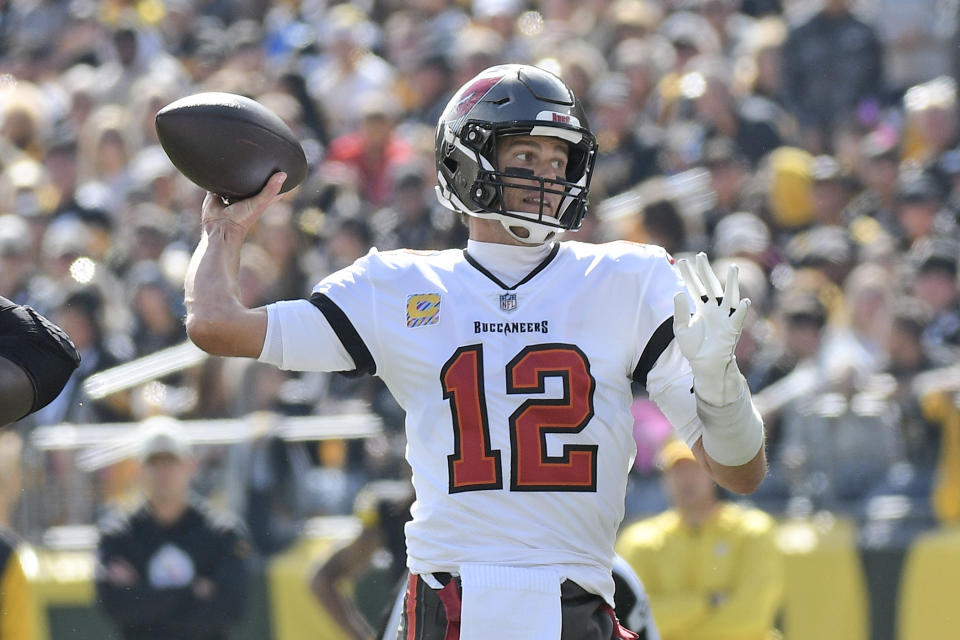 Tampa Bay Buccaneers quarterback Tom Brady (12) throws a pass during the first half of an NFL football game against the Pittsburgh Steelers in Pittsburgh, Sunday, Oct. 16, 2022. (AP Photo/Don Wright)