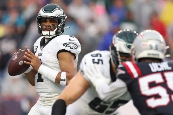 Jalen Hurts #1 of the Philadelphia Eagles attempts a pass during the second quarter against the <a class="link " href="https://sports.yahoo.com/nfl/teams/new-england/" data-i13n="sec:content-canvas;subsec:anchor_text;elm:context_link" data-ylk="slk:New England Patriots;sec:content-canvas;subsec:anchor_text;elm:context_link;itc:0">New England Patriots</a> at Gillette Stadium on September 10, 2023 in Foxborough, Massachusetts.<span class="copyright">Maddie Meyer—Getty Images</span>