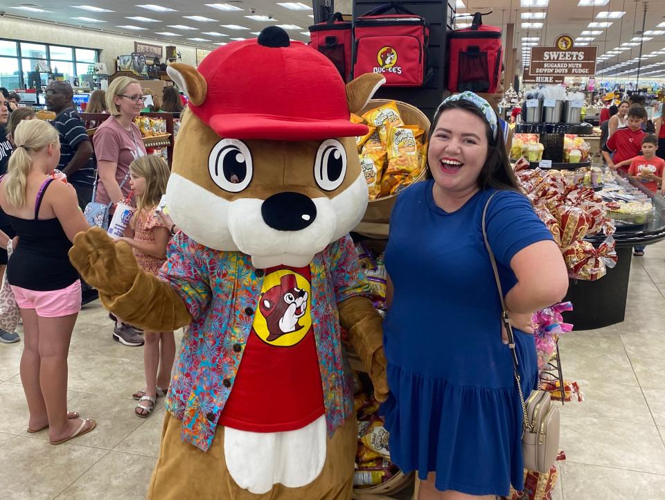 The writer poses next to Buc-ee the Beaver character