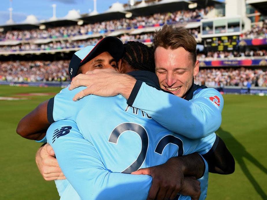 Jos Buttler, Adil Rashid and Archer embrace after England's World Cup final win in 2019: England Cricket via Twitter