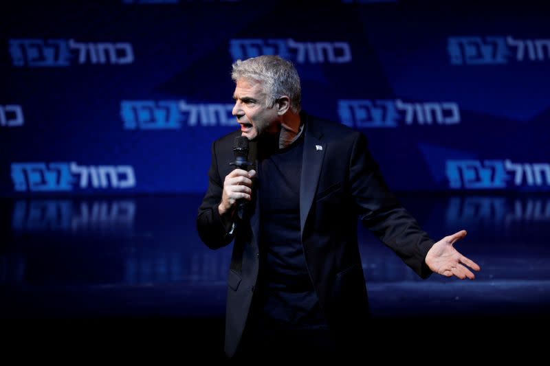 FILE PHOTO: Co-leader of Blue and White party, Yair Lapid, speaks to supporters at his election campaign event in Tel Aviv, Israel