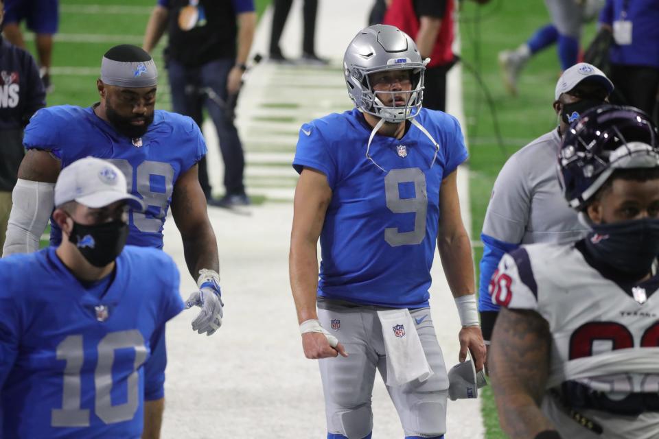 Lions quarterback Matthew Stafford walks off the field after the 41-25 loss to the Texans at Ford Field, Thursday, Nov. 26, 2020.