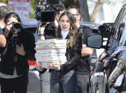 <p>Alison Brie looks absolutely swamped with paperwork during a skit for <i>Carpool Karaoke</i> in Los Angeles on Feb. 3.</p>