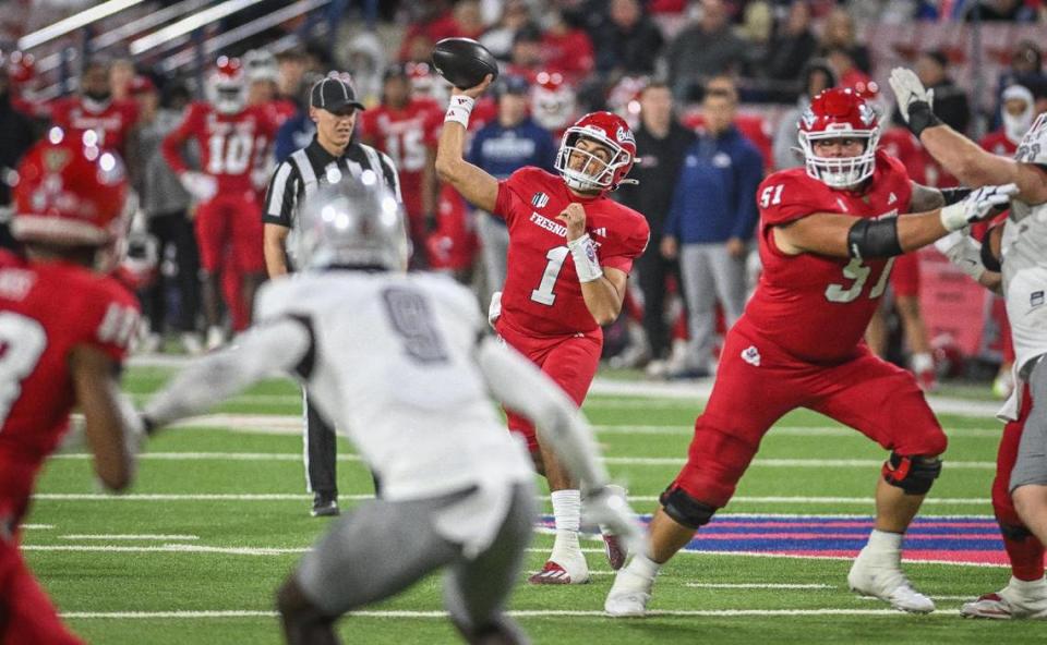 Fresno State quarterback Mikey Keene throws against UNLV during their game at Bulldog Stadium on Saturday, Oct. 28, 2023.