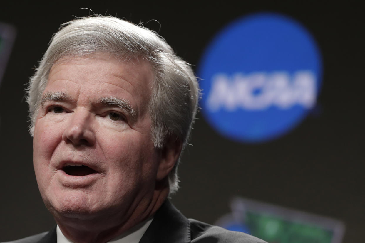 NCAA President Mark Emmert answers questions during a news conference at the Final Four college basketball tournament in Minneapolis. The NCAA Board of Governors voted Tuesday, April 27, 2021, to extend Emmert's contract by two years through 2025. Emmert’s contract was set to expire in 2023, but the board voted unanimously to extend his deal. (AP Photo/Matt York, File)